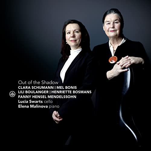Album cover featuring two women in black attire against a dark background.