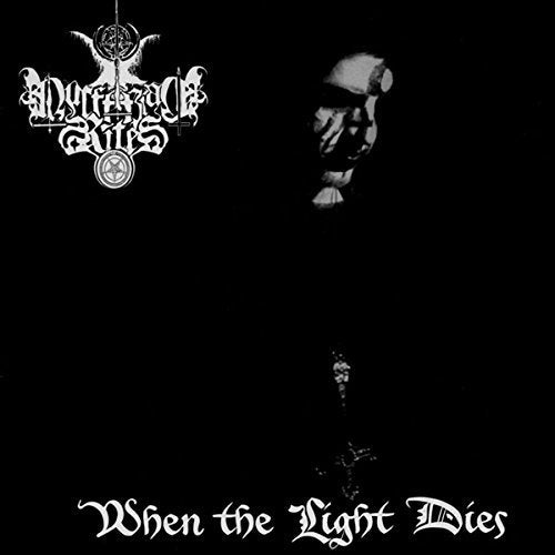 Dark album cover featuring band logo, masked figure, and ornate text.