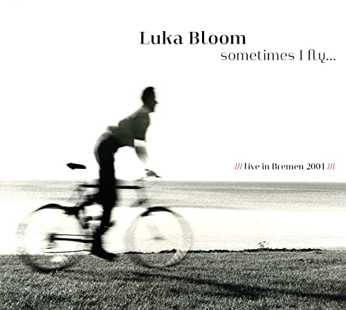 CD cover for Luka Bloom’s “Sometimes I Fly” featuring a blurred cyclist.