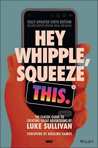 A hand holding a smartphone displaying the book title Hey Whipple, Squeeze This.