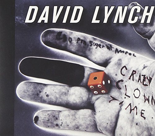 CD cover: hand, die, and text on a dark, textured background.