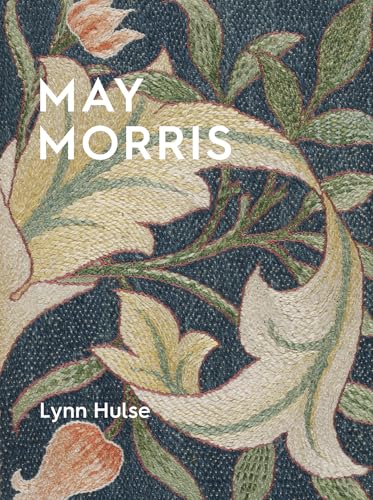 Book cover featuring intricate floral embroidery with white text on a dark blue background.