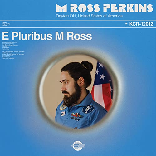 CD cover: Man in flight suit with American flag background.