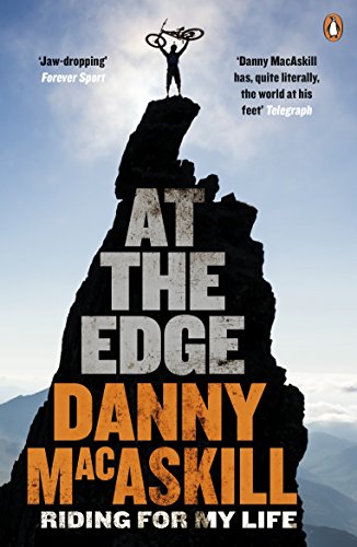 Book cover showing a silhouette of a man holding a bike atop a peak.