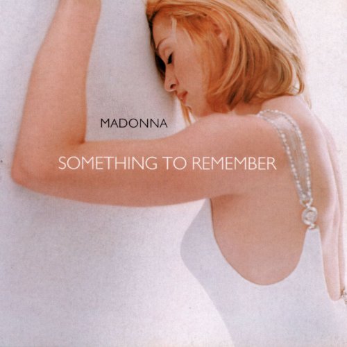 Madonna album cover, “Something to Remember,” featuring a reclining blonde woman.