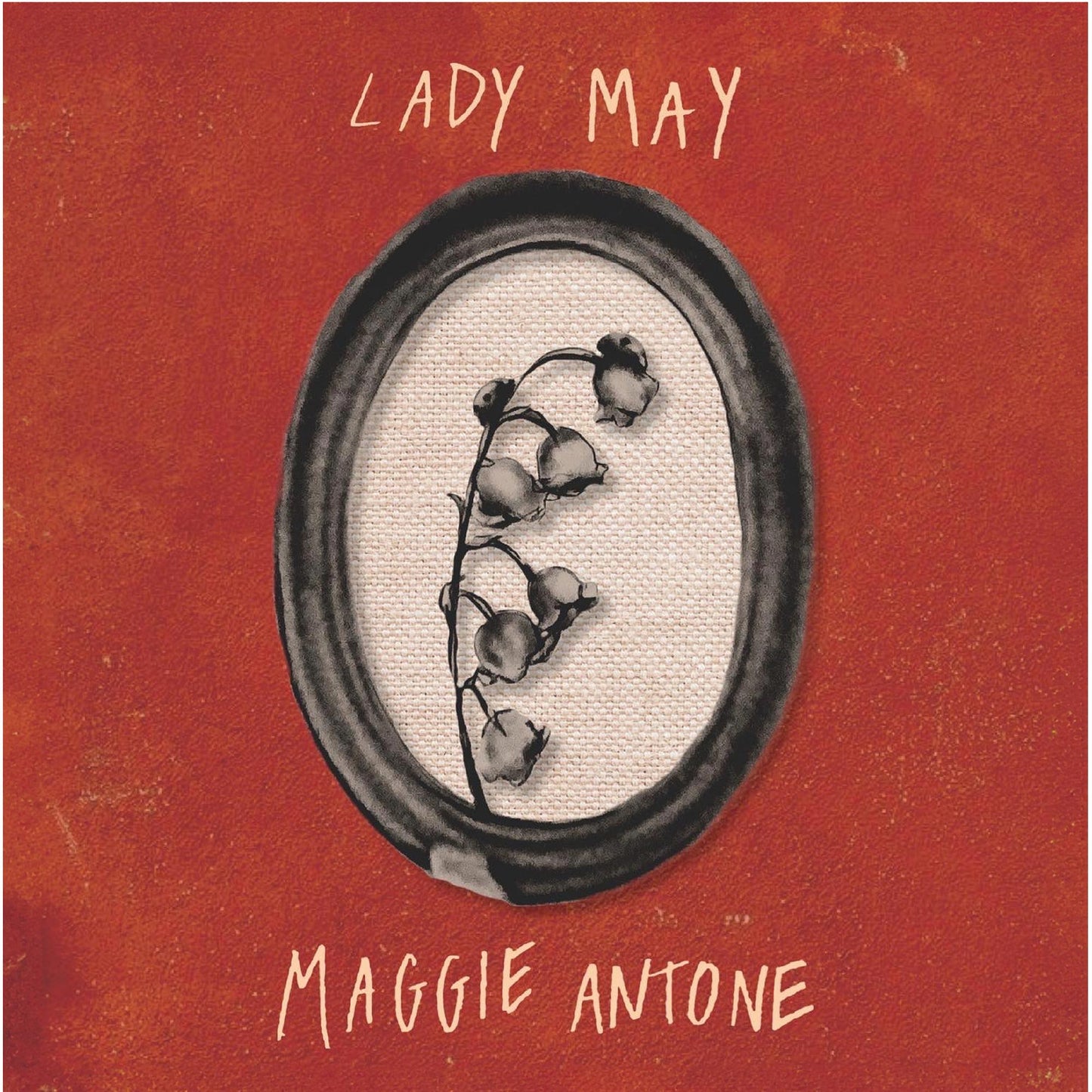 Red album cover with oval portrait of cotton plant and text.