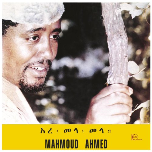 Mahmoud Ahmed portrait on vinyl record cover, holding a tree branch.