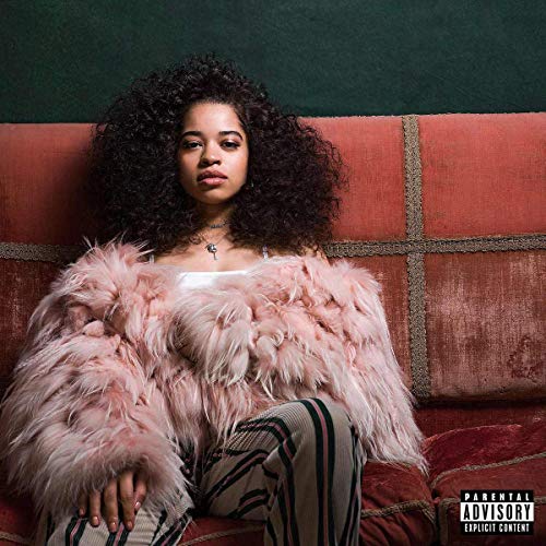 Ella Mai album cover: woman with large afro and pink fur coat.