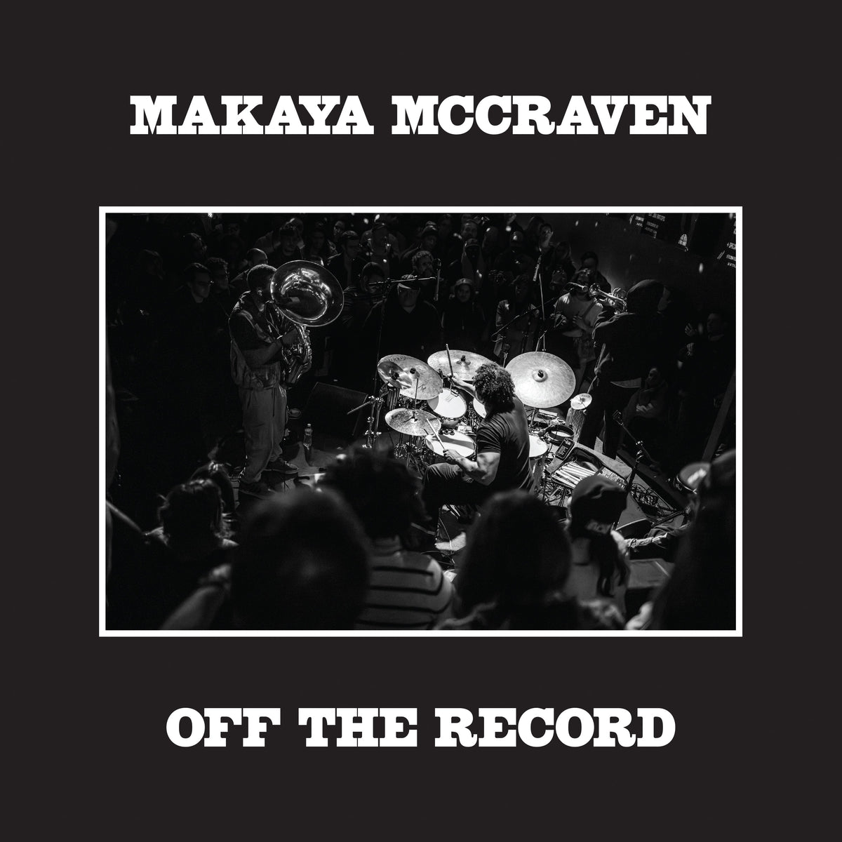 Makaya McCraven album cover: black and white jazz band performance photo.