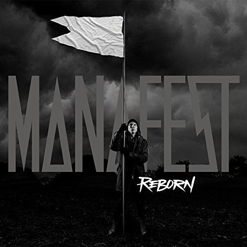 A person stands in a dark field holding a white flag under a cloudy sky.