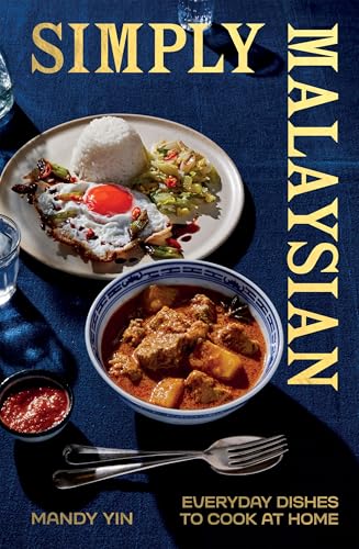 Cookbook cover featuring Malaysian food: curry, rice, and fried egg.