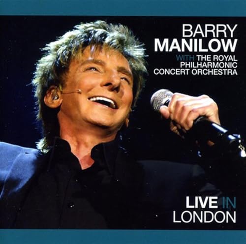 Barry Manilow singing into a microphone on a CD cover.