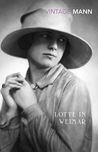 Vintage book cover featuring a black and white portrait of a woman in a hat.