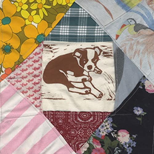 Patchwork fabric collage featuring a brown dog illustration surrounded by various colorful patterns.