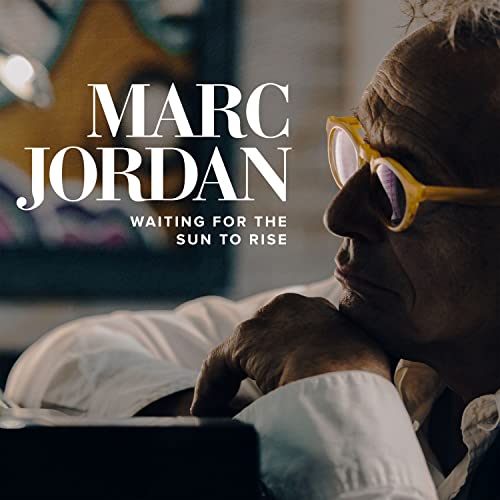 CD cover featuring a close-up of Marc Jordan in yellow glasses.