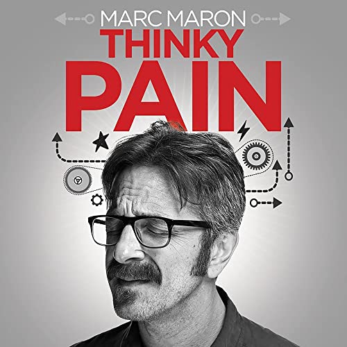 Marc Maron with eyes closed, wearing glasses, with Thinky Pain text and gear graphics.
