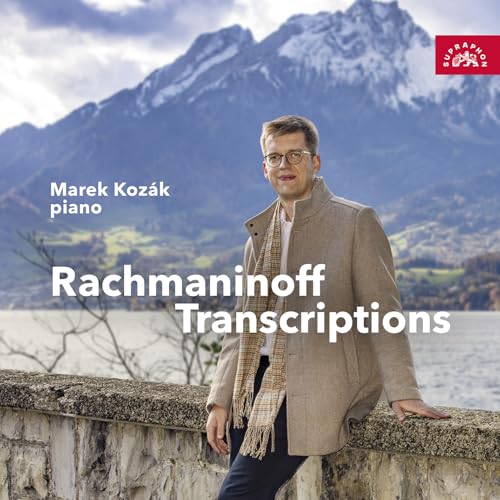 CD cover featuring pianist Marek Kozak with mountain backdrop.