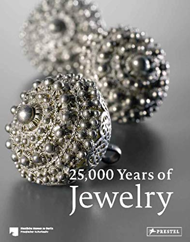 Silver filigree jewelry book cover, “25,000 Years of Jewelry.”