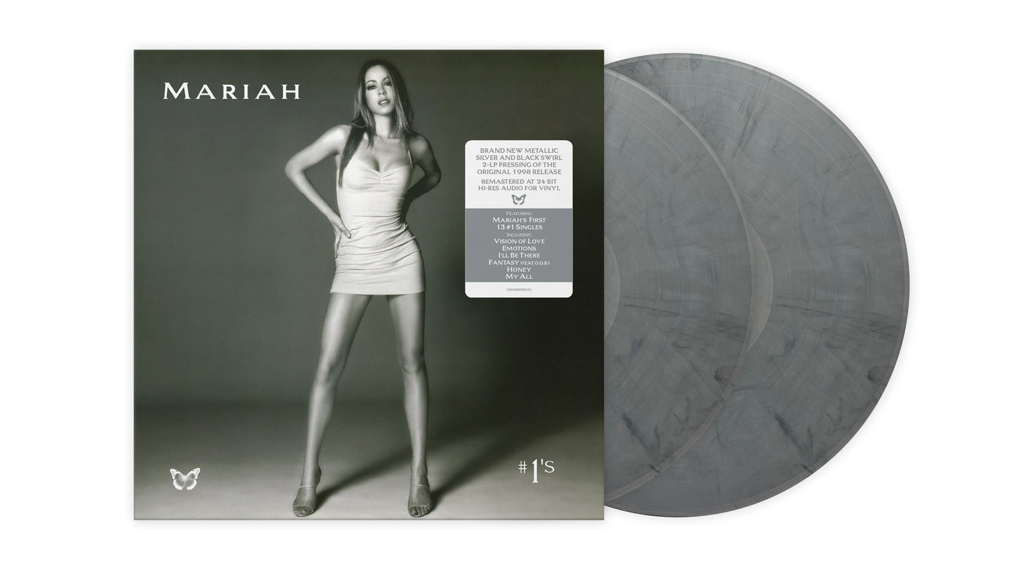 Mariah Carey #1s vinyl album cover with two metallic silver and black swirl records.