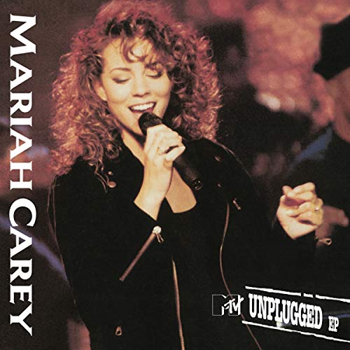 Mariah Carey singing into a microphone on an MTV Unplugged album cover.
