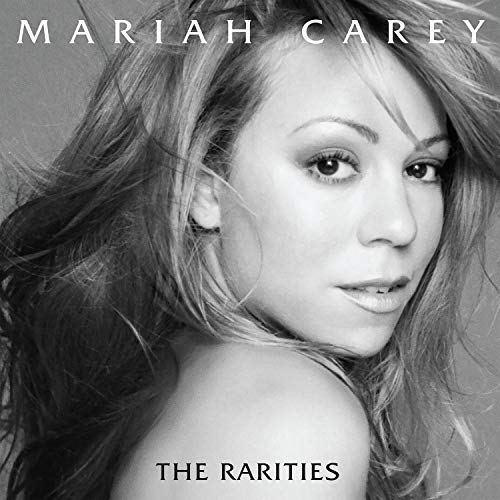 Black and white close-up portrait of Mariah Carey for the album The Rarities.