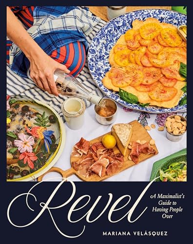 Cookbook cover with abundant food display and title "Revel" in script.