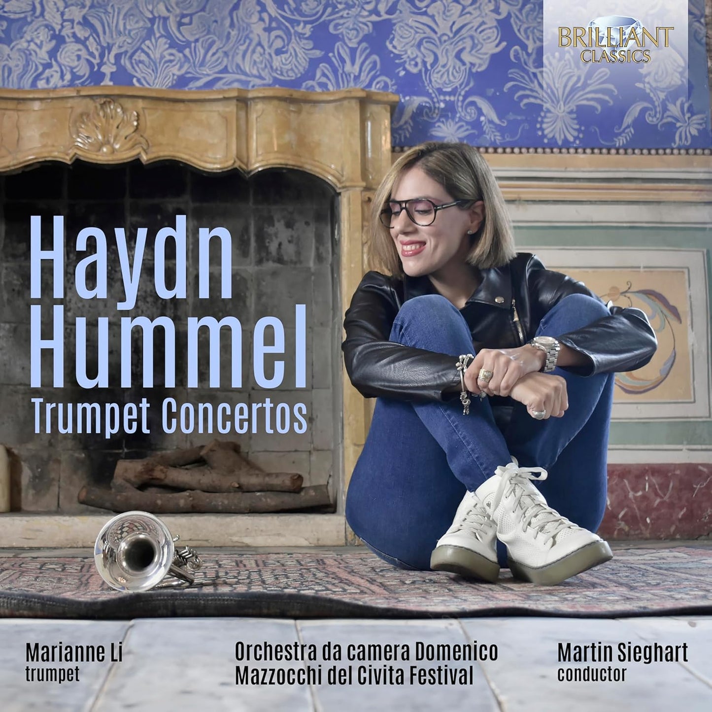 CD cover: Marianne Li, trumpet, with orchestra and fireplace backdrop.