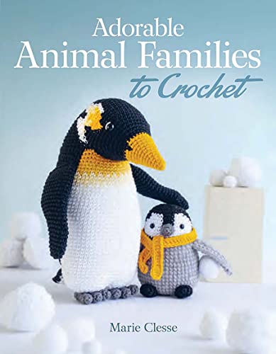 Crocheted penguin family with a parent and chick, book cover.