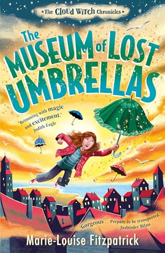 A girl holding a green umbrella flies over a town at sunset.