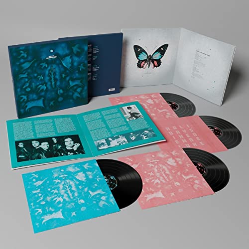 Marillion’s “Holidays In Eden” vinyl box set with records and booklets.