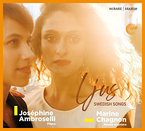 CD cover featuring two women, warm lighting, and handwritten title "Ljus.