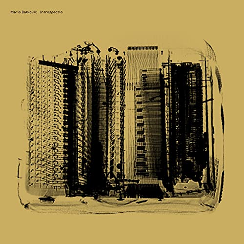 Album cover with a dark, abstract X-ray image of an accordion on tan background.