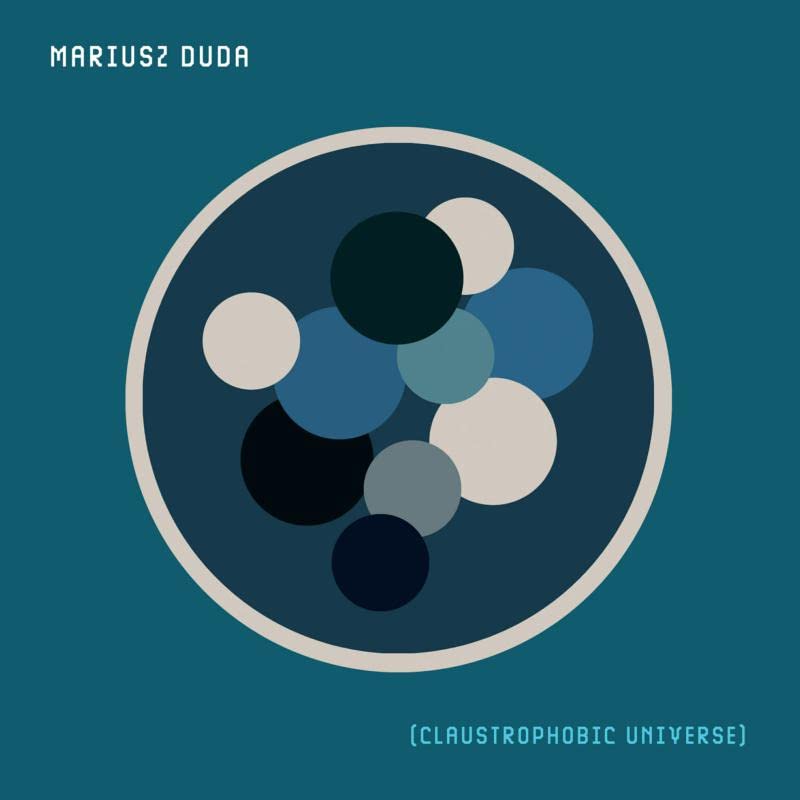 Album cover for Mariusz Duda’s “Claustrophobic Universe” featuring abstract circles.
