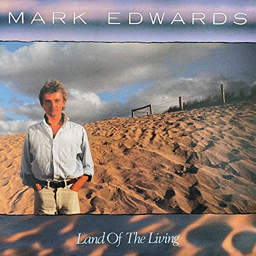 CD cover: Mark Edwards portrait on a sandy landscape.