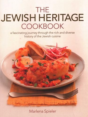 Cookbook with Jewish dishes, likely featuring photos, on a table or kitchen counter background.