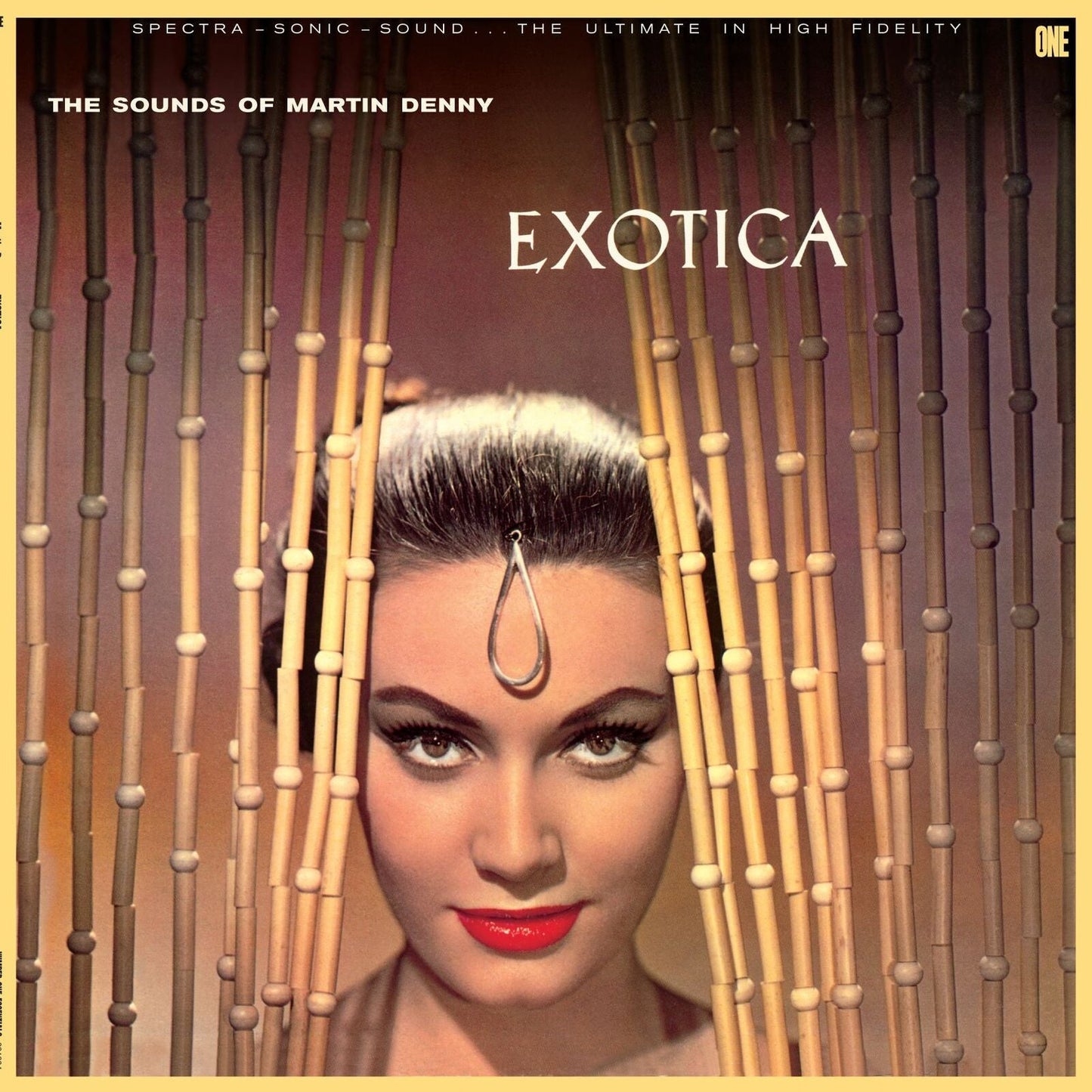 Woman with a forehead ornament peeking through bamboo bead curtains on album cover.