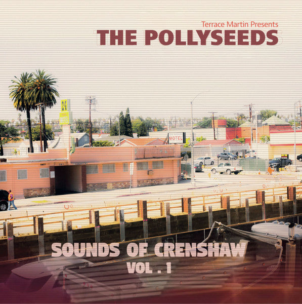 Vinyl album cover featuring a motel scene under a blue sky.