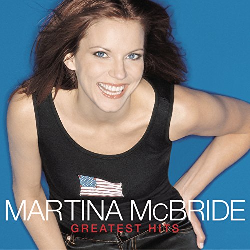 Martina McBride's "Greatest Hits" CD cover featuring a smiling portrait of the singer.