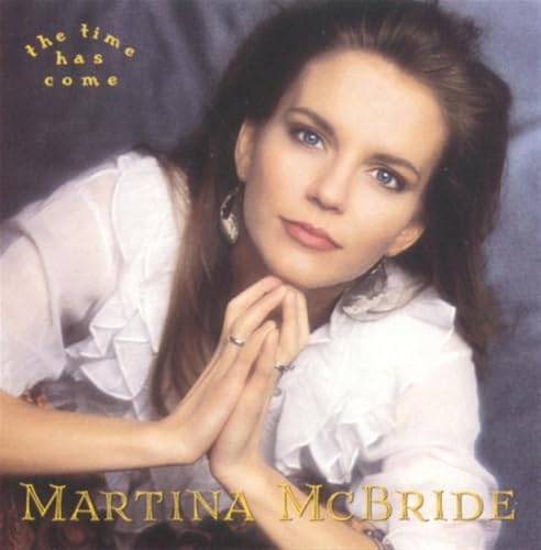 Martina McBride album cover, portrait of a woman with wavy hair.