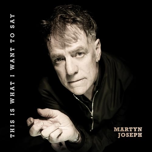 Martyn Joseph album cover: portrait of a man in black clothing.