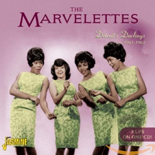 The Marvelettes, four women in green dresses, album cover from Jasmine Records.
