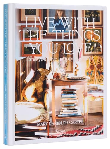Book cover featuring a gold elephant figurine, a stack of books, and framed art.