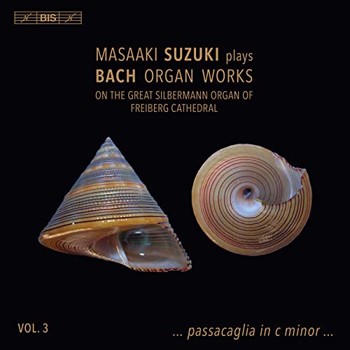 CD cover: black background with seashell images and text details.