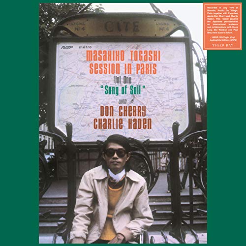 Vinyl album cover featuring a man in front of a Paris metro sign.