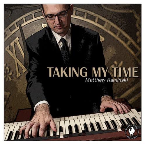 Matthew Kaminski at a piano, album cover with clock background.