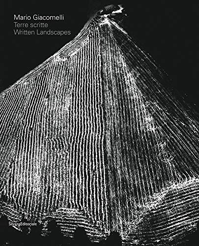 Book cover featuring a high-contrast black and white aerial photograph of plowed fields.