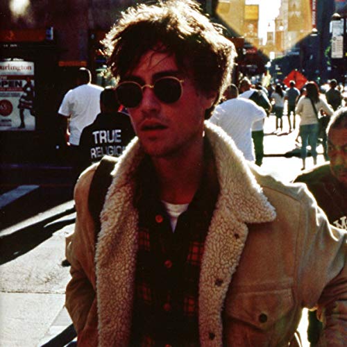 Max Jury album cover: portrait of a man with curly hair and sunglasses.