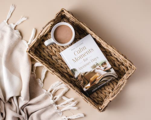 A book titled Calm Moments for Anxious Days and a coffee mug in a basket.