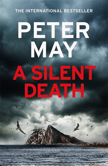 Book cover: stormy seascape with a rocky island and red title text.