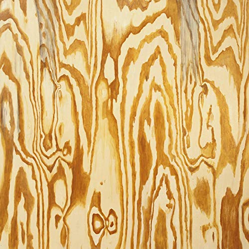 Close-up of light brown wood grain with swirling patterns.